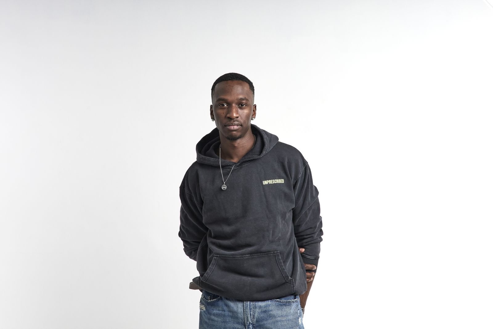 Model in an Unprescribed hoodie
